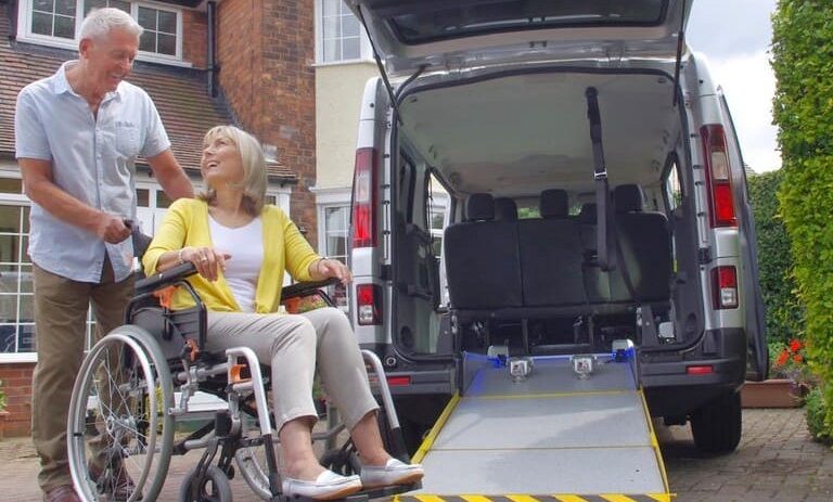 Husband and wide with adapted minivan