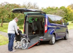 retirement home residents enter the rear by wheelchair access
